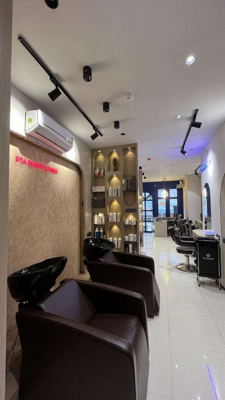 Hair wash basins and chairs inside IPSA